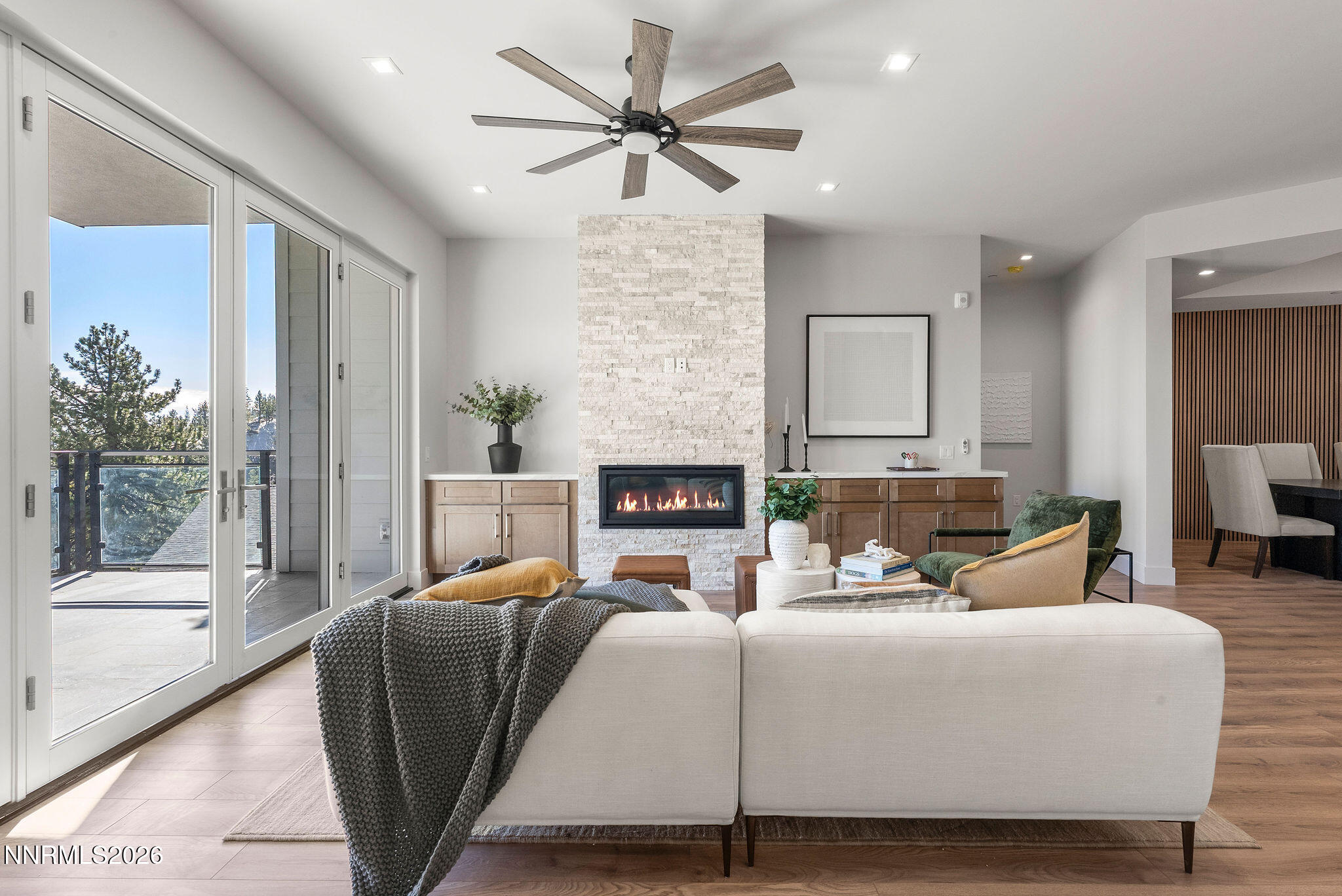 323 Tramway Drive, Unit 107 Stateline, NV 89449 - Photo 7 of 27 a living room with furniture and a fireplace