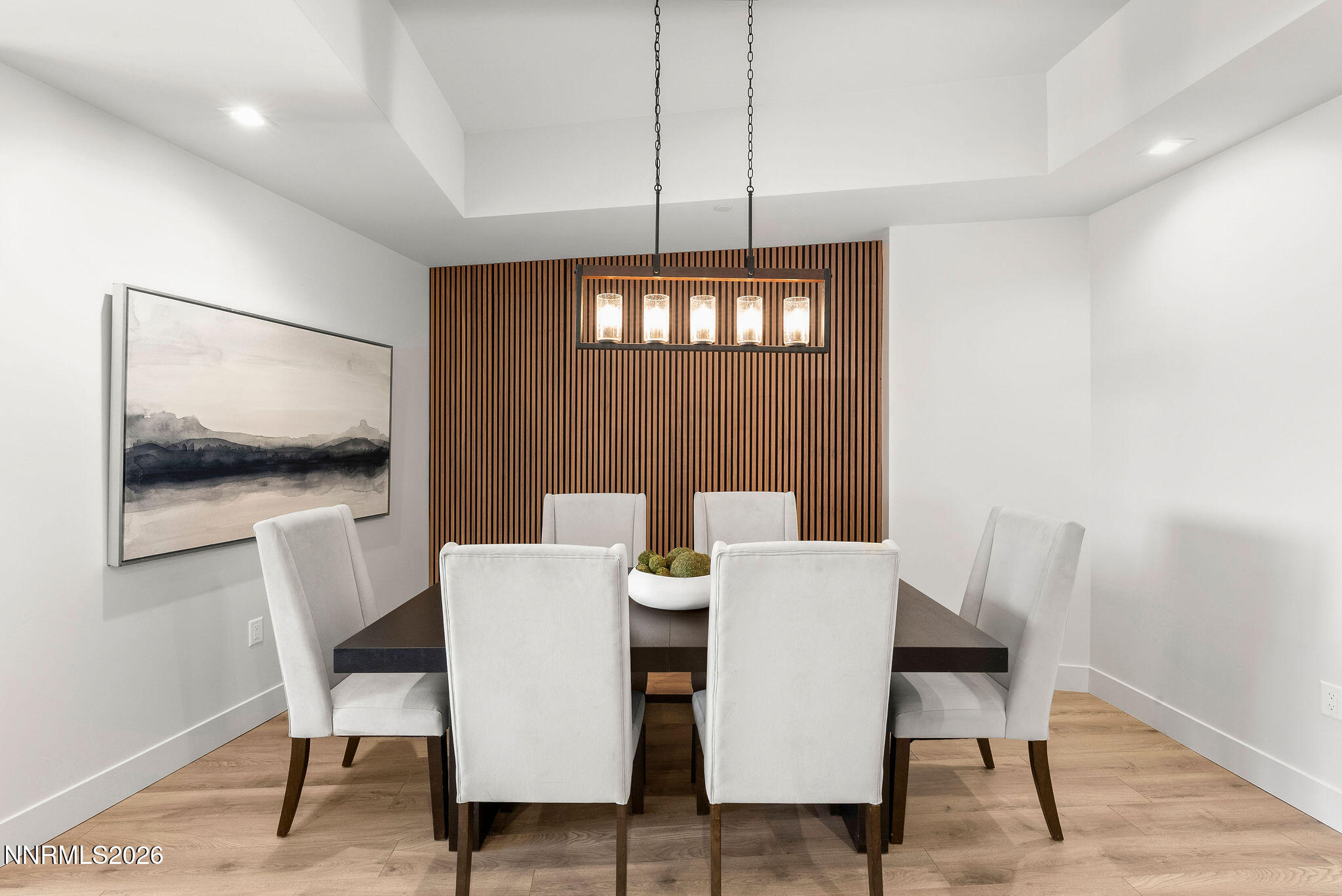 323 Tramway Drive, Unit 107 Stateline, NV 89449 - Photo 9 of 27 a view of a dining room with furniture window and wooden floor