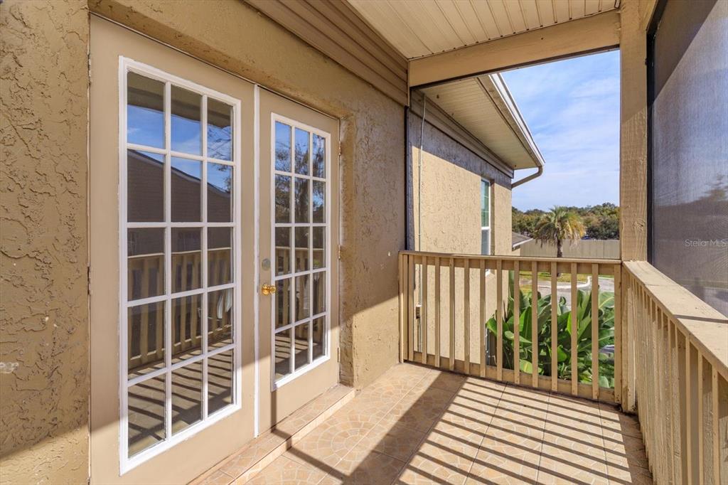 395 Wymore Road, Unit 207 Altamonte Springs, FL 32714 - Photo 12 of 32 a view of balcony with wooden floor and windows