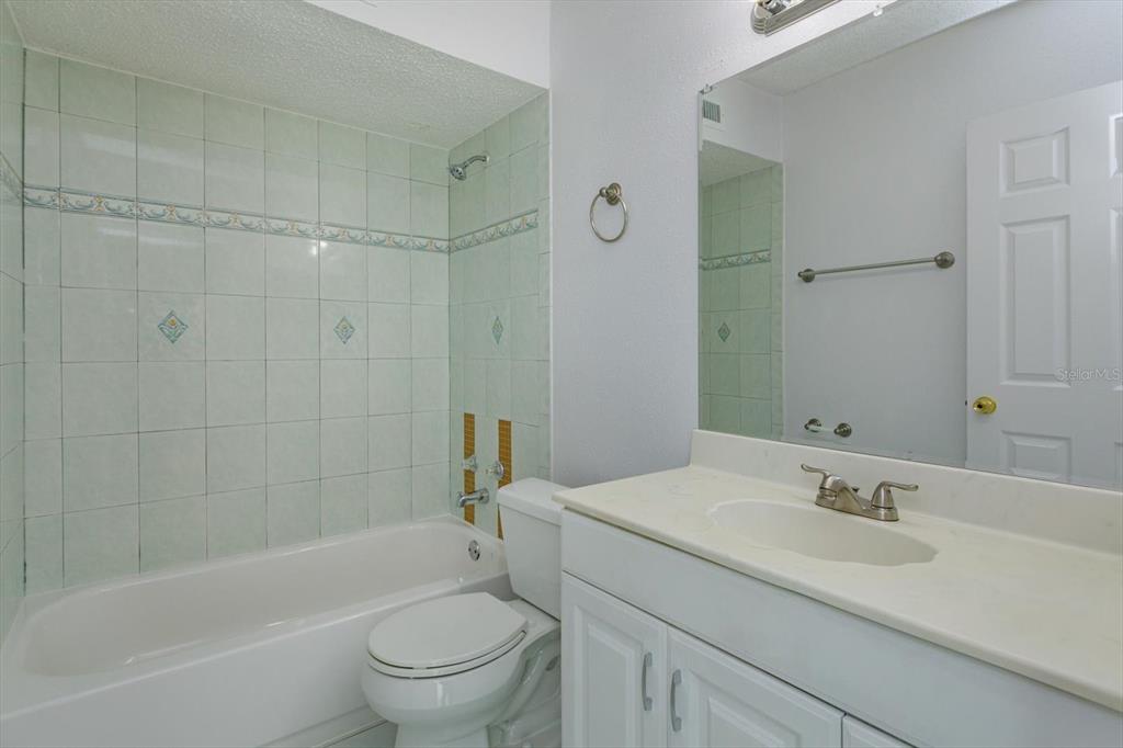 395 Wymore Road, Unit 207 Altamonte Springs, FL 32714 - Photo 16 of 32 a bathroom with a sink toilet and shower