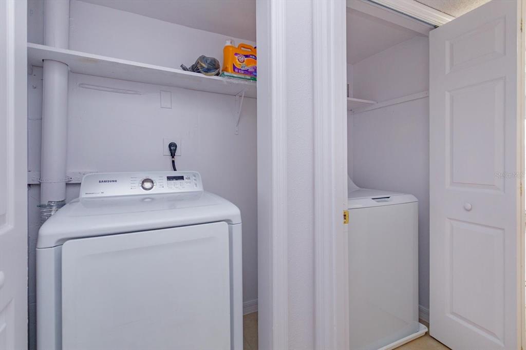 395 Wymore Road, Unit 207 Altamonte Springs, FL 32714 - Photo 20 of 32 a utility room with dryer and washer