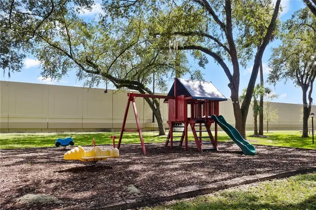 a bench sitting in the middle of a park