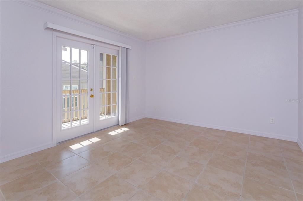 395 Wymore Road, Unit 207 Altamonte Springs, FL 32714 - Photo 8 of 32 an empty room with windows