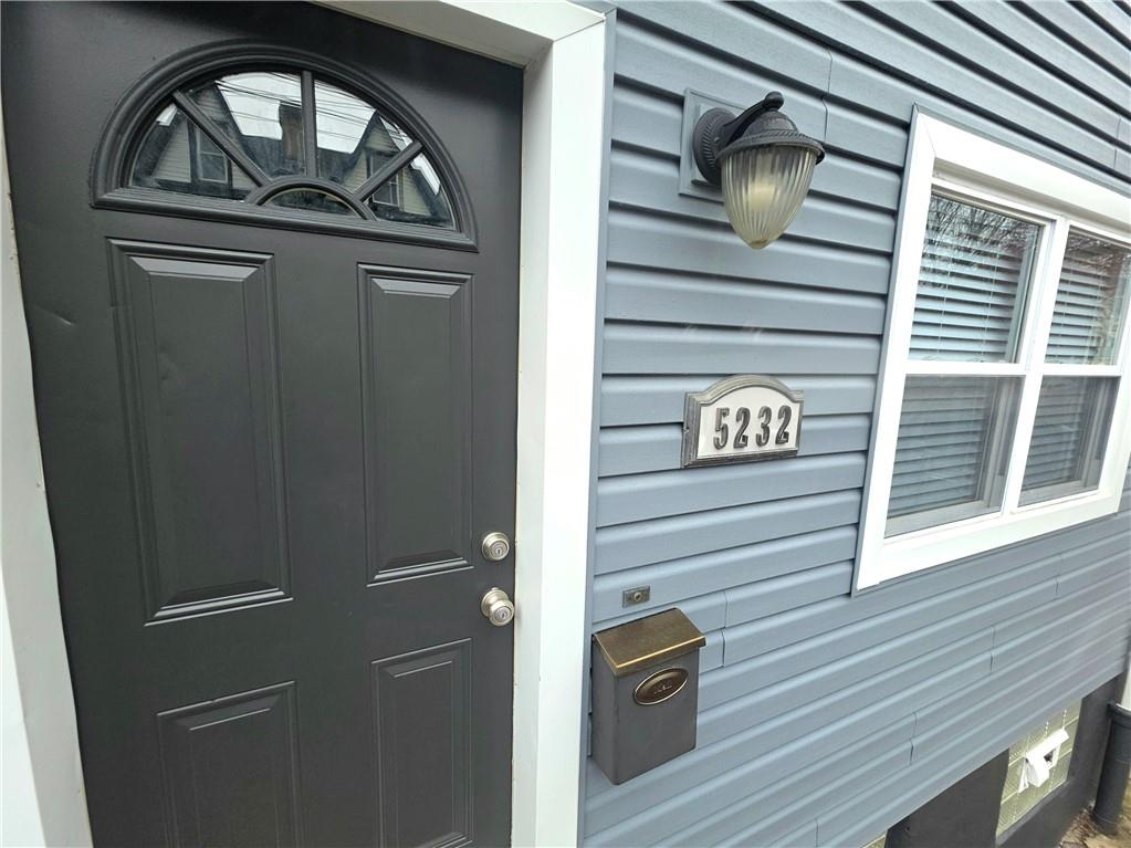 5232 Keystone Street Pittsburgh, PA 15201 - Photo 1 of 48 a view of a door and a window