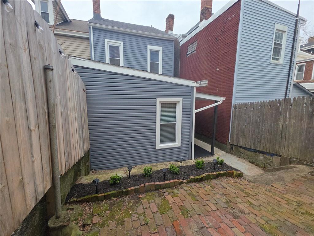 5232 Keystone Street Pittsburgh, PA 15201 - Photo 15 of 48 a front view of a house with a yard