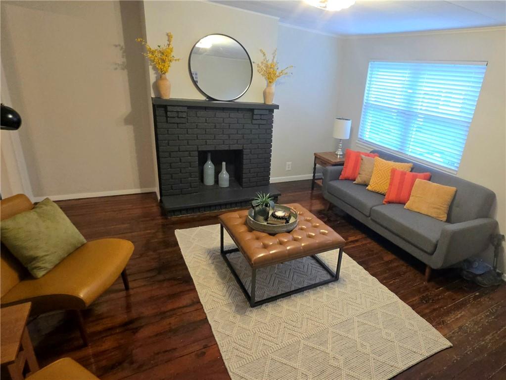 5232 Keystone Street Pittsburgh, PA 15201 - Photo 19 of 48 a living room with furniture rug and fireplace