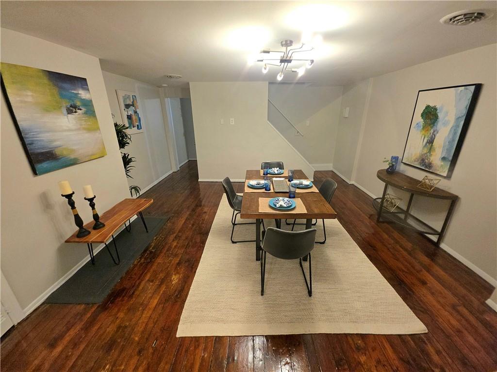 5232 Keystone Street Pittsburgh, PA 15201 - Photo 22 of 48 a living room with furniture rug and wooden floor