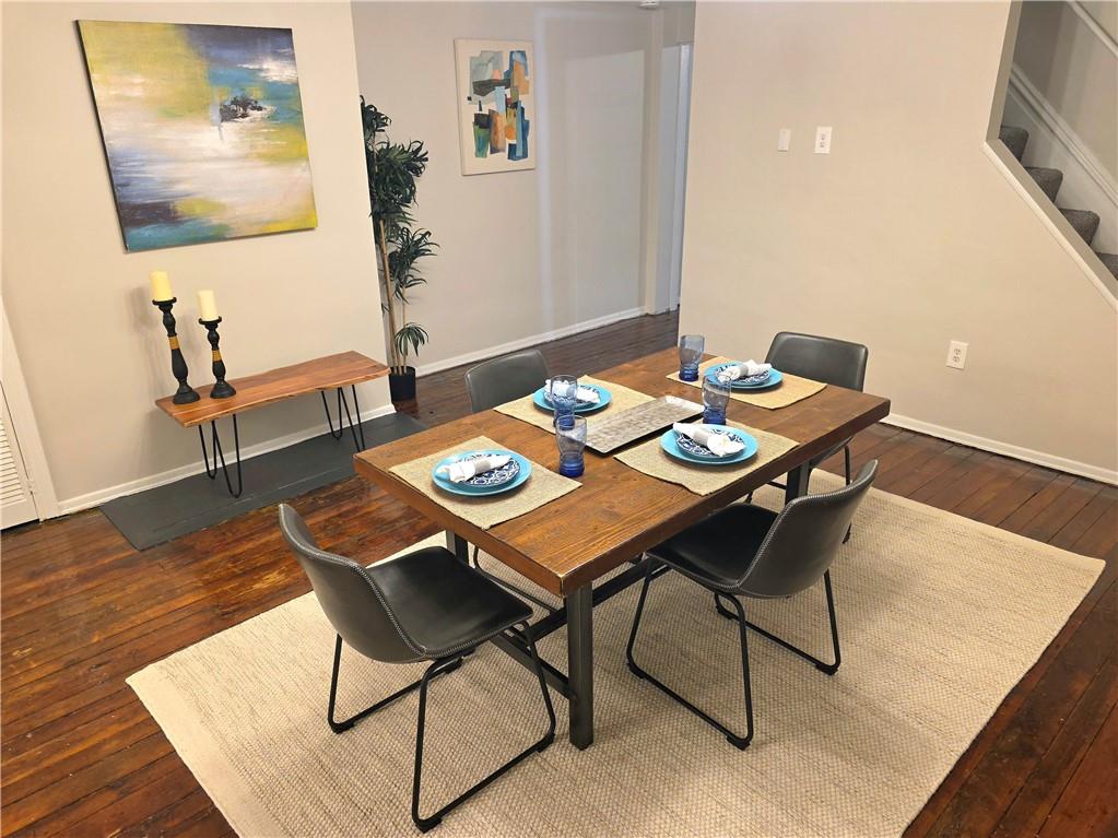 5232 Keystone Street Pittsburgh, PA 15201 - Photo 23 of 48 a view of a dining room with furniture and wooden floor