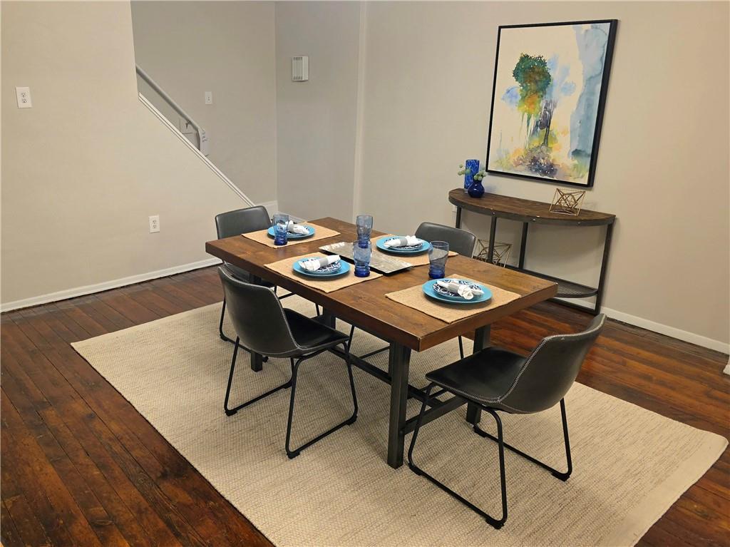 5232 Keystone Street Pittsburgh, PA 15201 - Photo 25 of 48 a view of a dining room with furniture and wooden floor