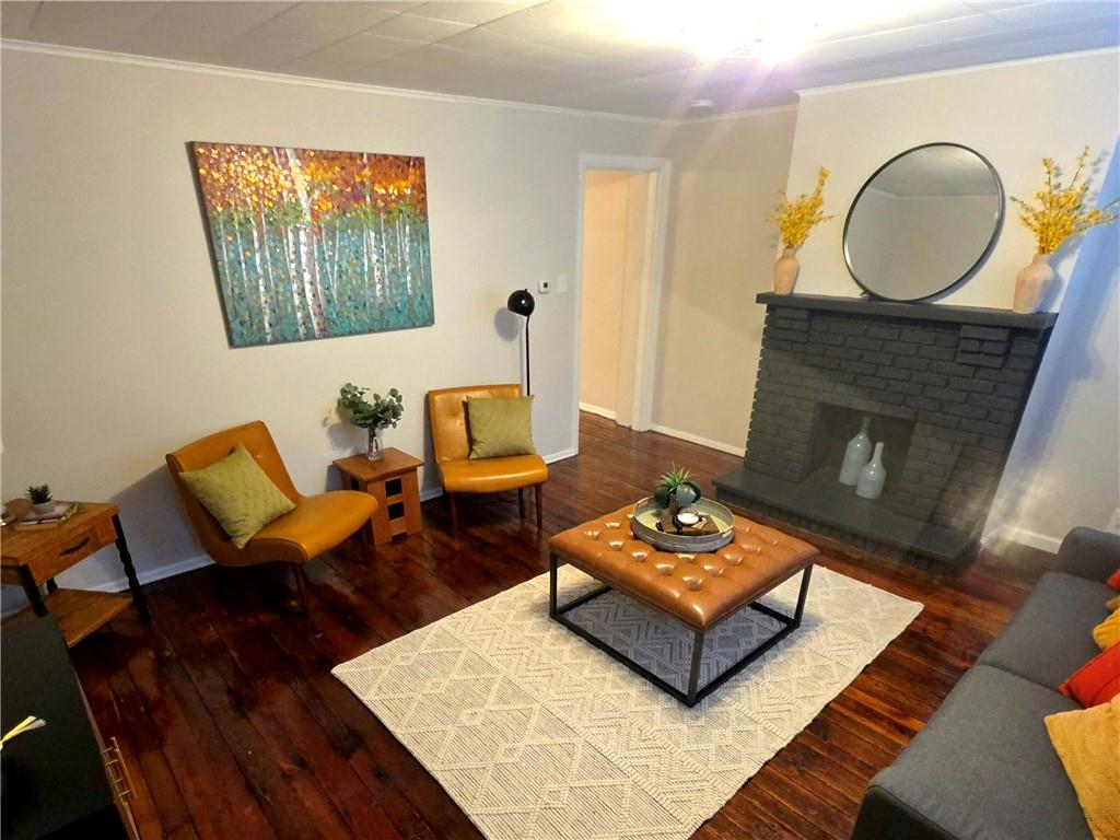 5232 Keystone Street Pittsburgh, PA 15201 - Photo 3 of 48 a living room with furniture and a fireplace