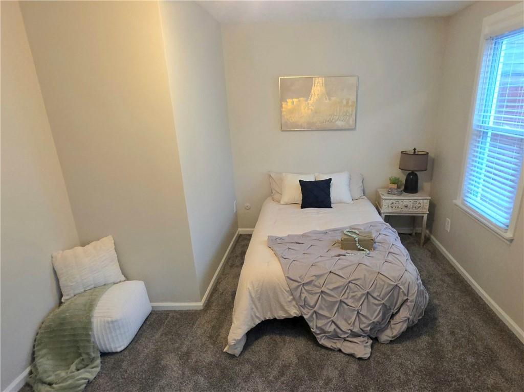 5232 Keystone Street Pittsburgh, PA 15201 - Photo 35 of 48 a bedroom with a bed and a window