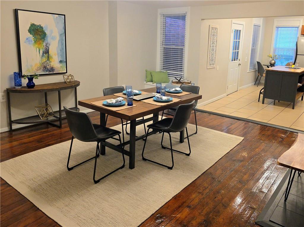 5232 Keystone Street Pittsburgh, PA 15201 - Photo 6 of 48 a view of a dining room with furniture and wooden floor