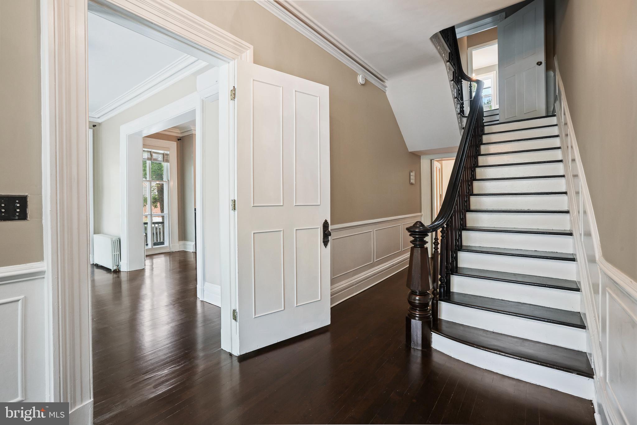 12 Murray Place Princeton, NJ 08540 - Photo 11 of 47 a view of a hallway with wooden floor staircase and windows