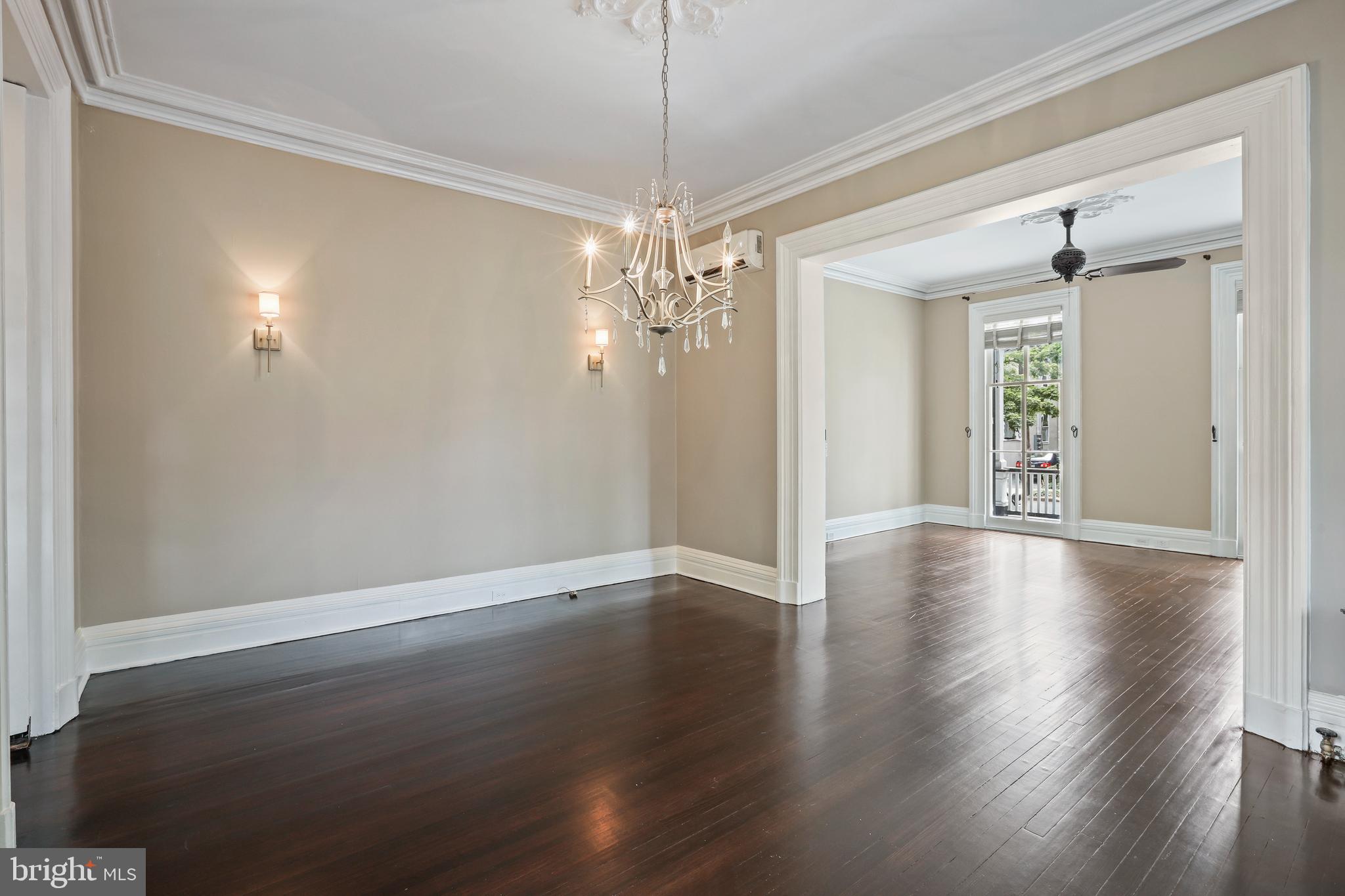 12 Murray Place Princeton, NJ 08540 - Photo 17 of 47 a view of a hallway with wooden floor and chandelier