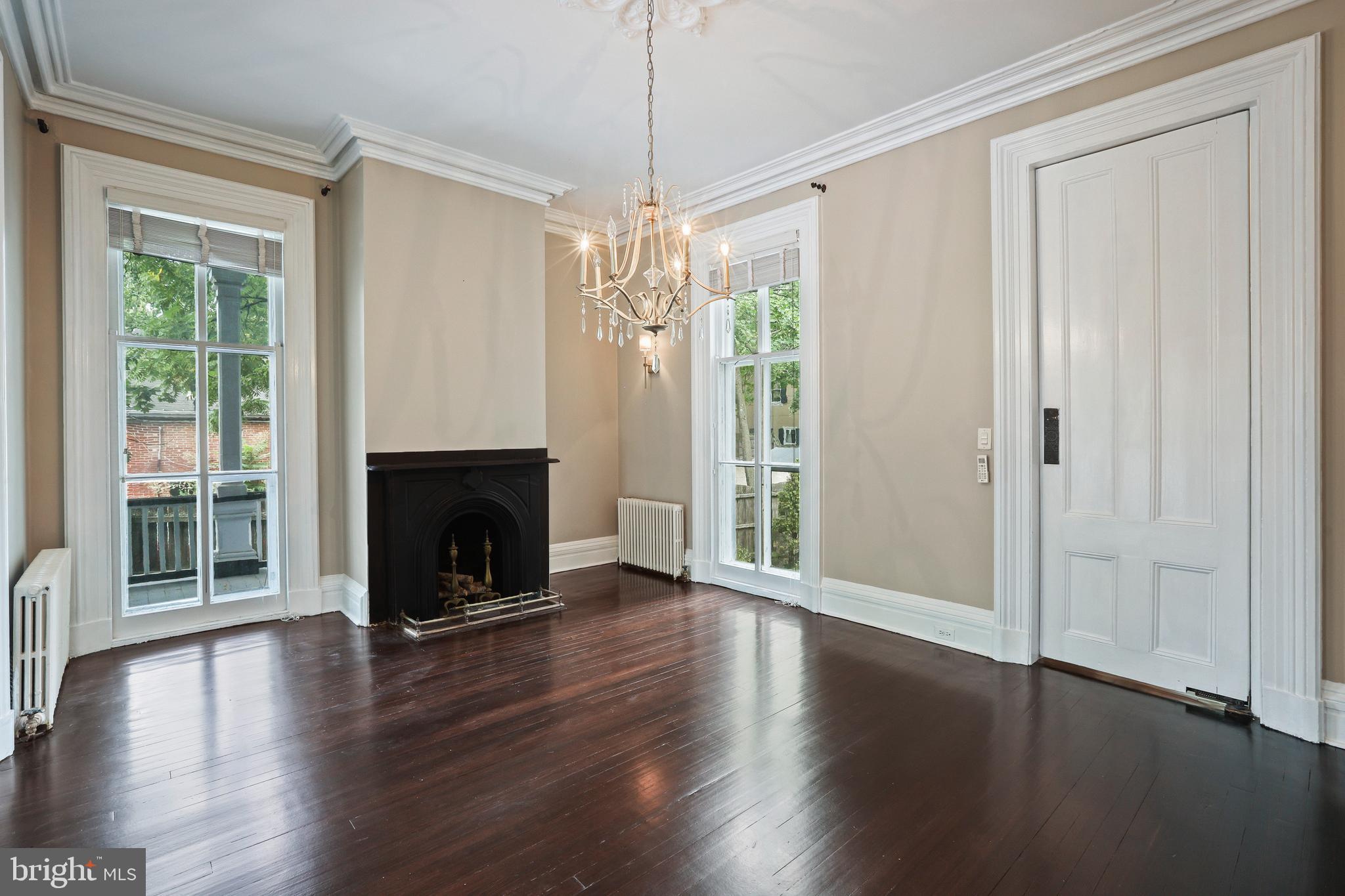 12 Murray Place Princeton, NJ 08540 - Photo 19 of 47 a view of a livingroom with wooden floor fireplace and windows