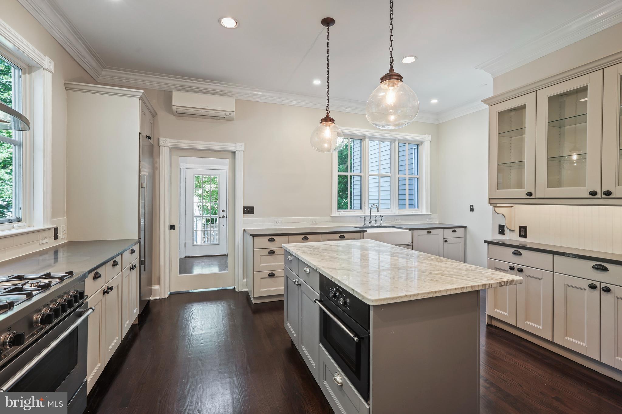 12 Murray Place Princeton, NJ 08540 - Photo 21 of 47 a kitchen with a stove sink and cabinets
