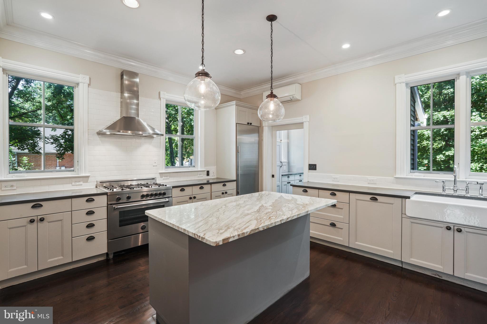 12 Murray Place Princeton, NJ 08540 - Photo 22 of 47 a kitchen with a stove a sink a center island and windows