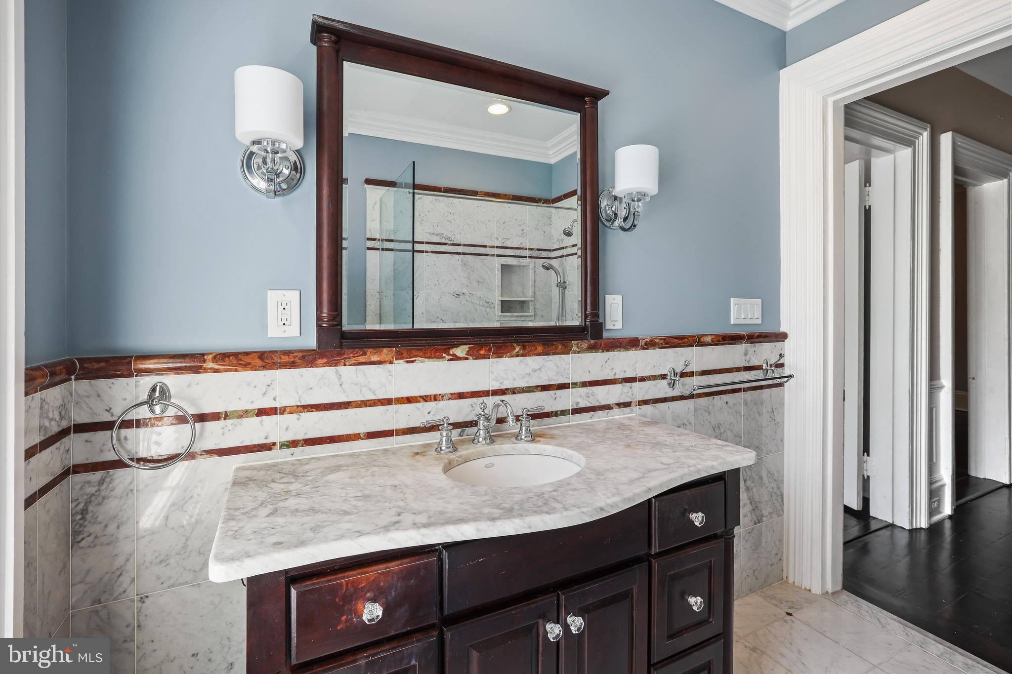 12 Murray Place Princeton, NJ 08540 - Photo 37 of 47 a bathroom with a sink and a mirror