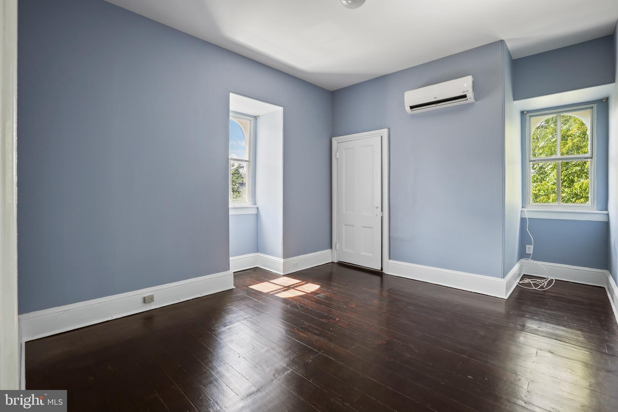 12 Murray Place Princeton, NJ 08540 - Photo 42 of 47 an empty room with wooden floor and windows