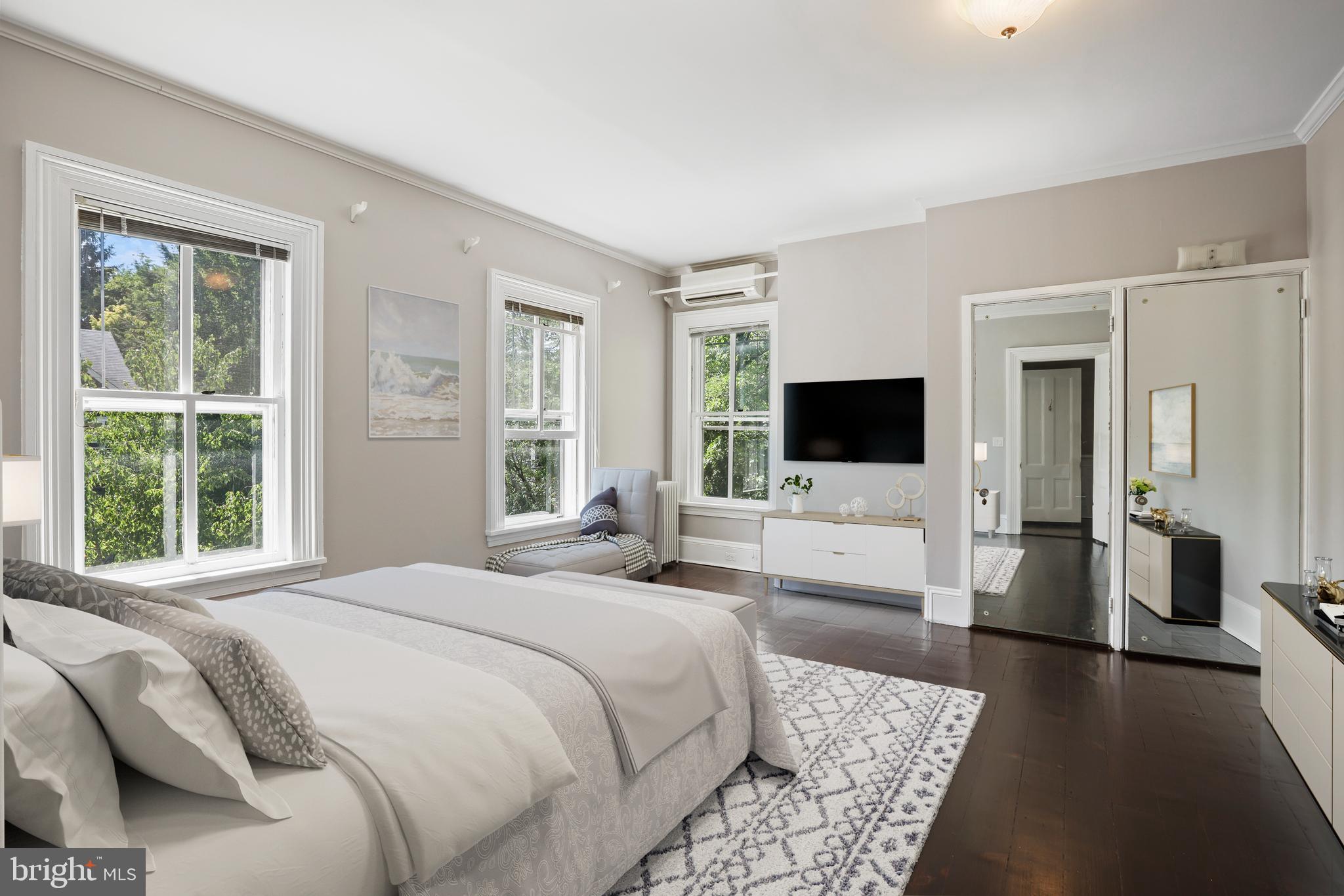 12 Murray Place Princeton, NJ 08540 - Photo 8 of 47 a bedroom with a bed a flat screen tv and a couch