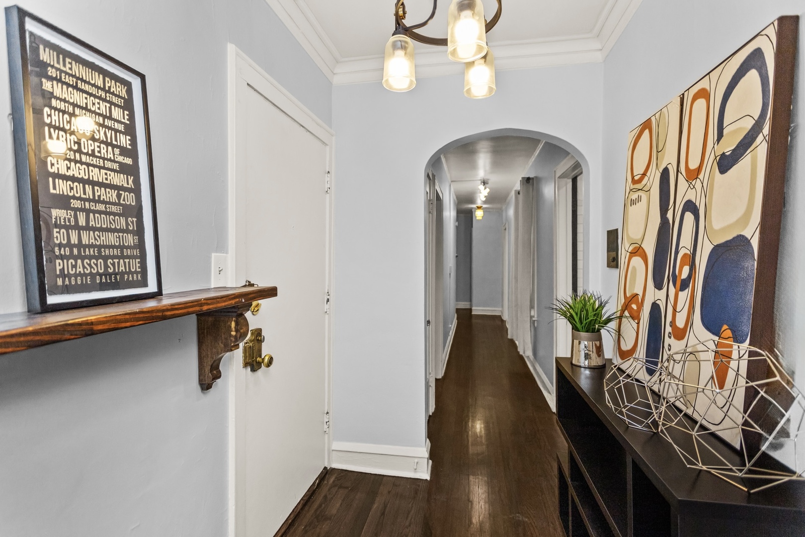 7523 North Seeley Avenue, Unit 1 Chicago, IL 60645 - Photo 2 of 18 a view of a livingroom with furniture and staircase