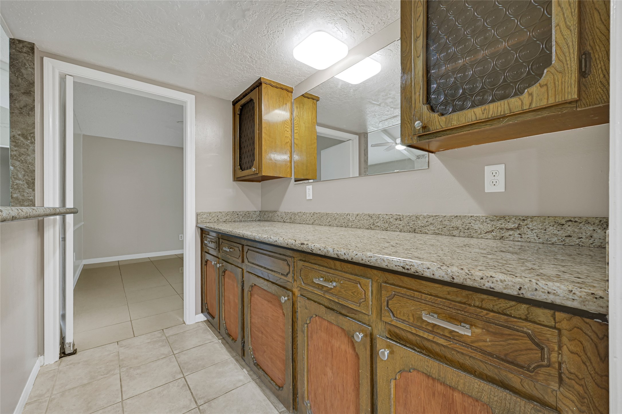 20135 Timber Line Lane New Caney, TX 77357 - Photo 15 of 30 a bathroom with a sink and a mirror