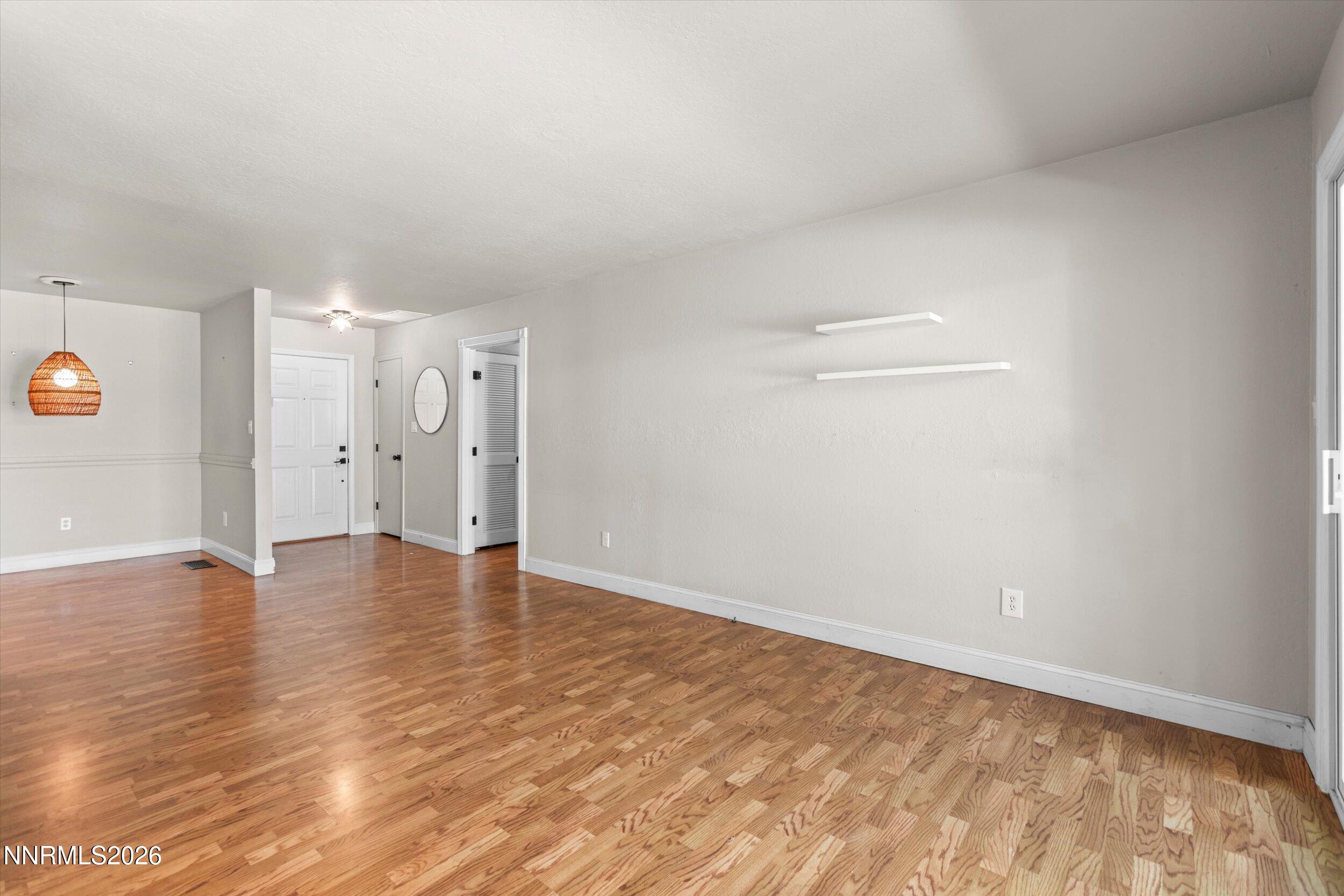 2300 Dickerson Road, Unit 51 Reno, NV 89503 - Photo 11 of 46 wooden floor in an empty room