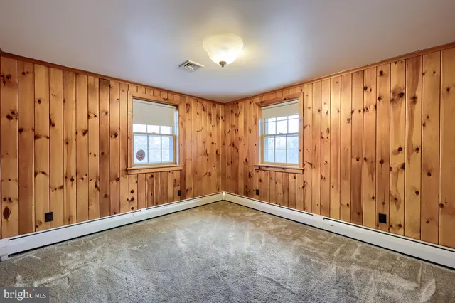 a bathroom with a tub and a shower