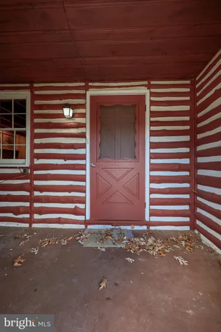 a view of room with stairs and a closet