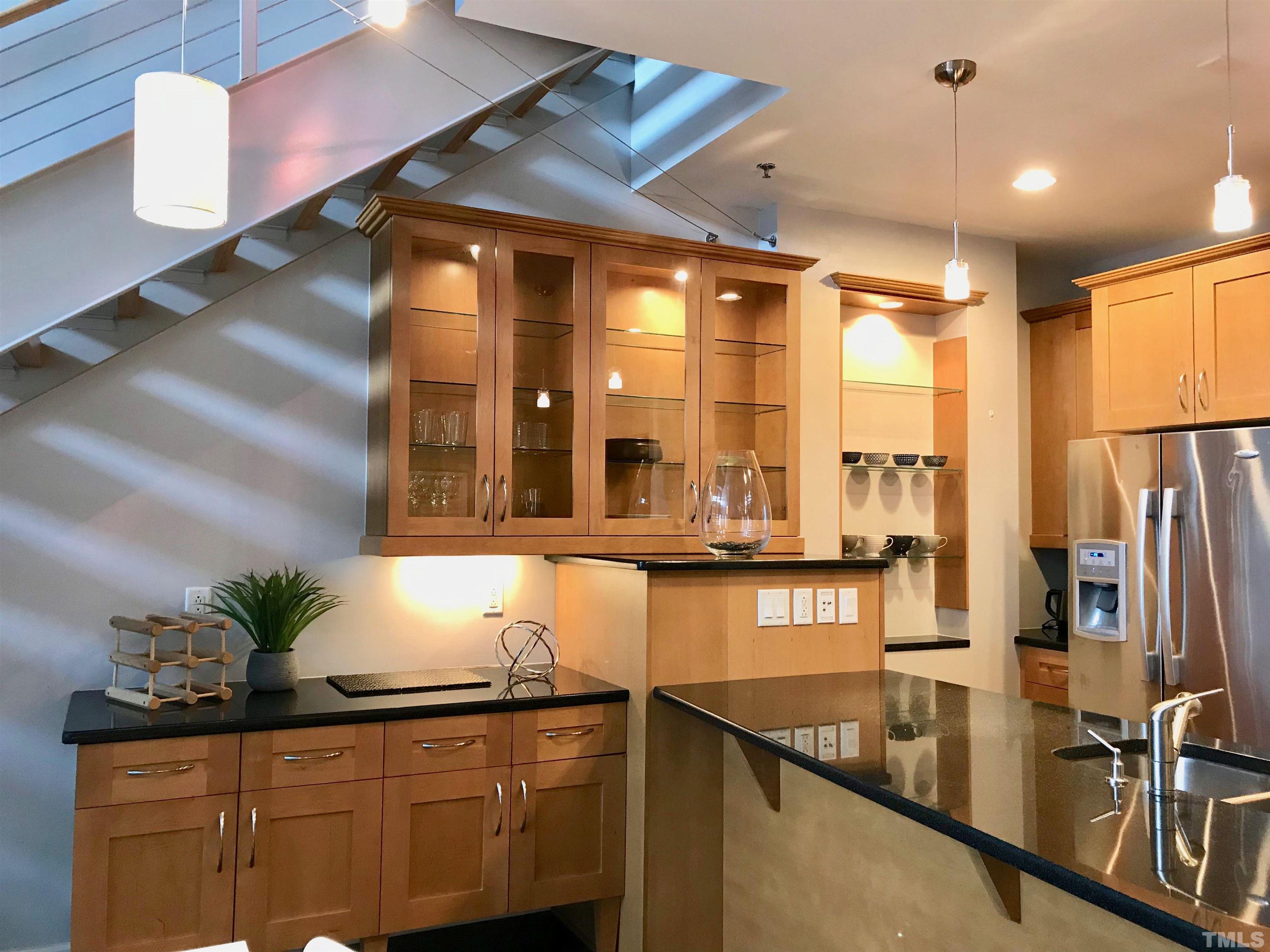 2608 Erwin Road, Unit 417 Durham, NC 27705 - Photo 7 of 39 a kitchen with stainless steel appliances a sink a counter space and cabinets