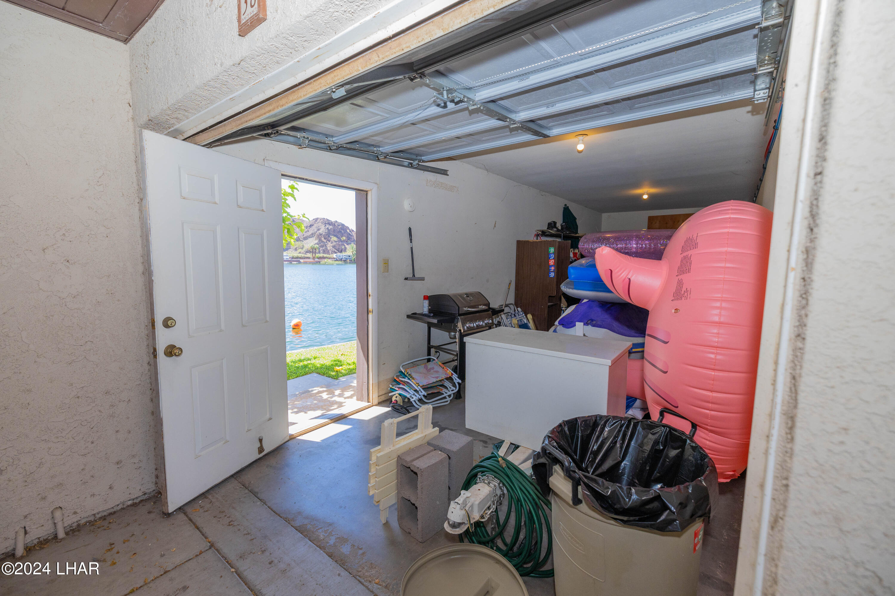 9170 Riverside Drive, Unit 38 Parker, AZ 85344 - Photo 23 of 23 Garage, straight to River Access and Private Stairwell.