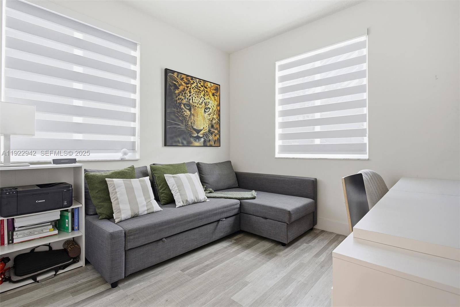 6420 Northwest 102nd Path, Unit 110 Doral, FL 33178 - Photo 26 of 47 a living room with furniture and a window