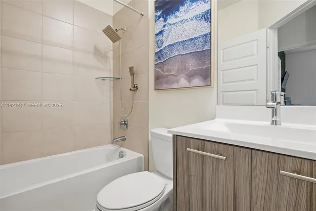 a view of a city with an ocean view