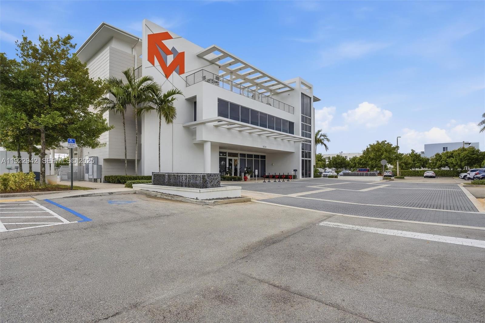 6420 Northwest 102nd Path, Unit 110 Doral, FL 33178 - Photo 31 of 47 a view of a building with a street