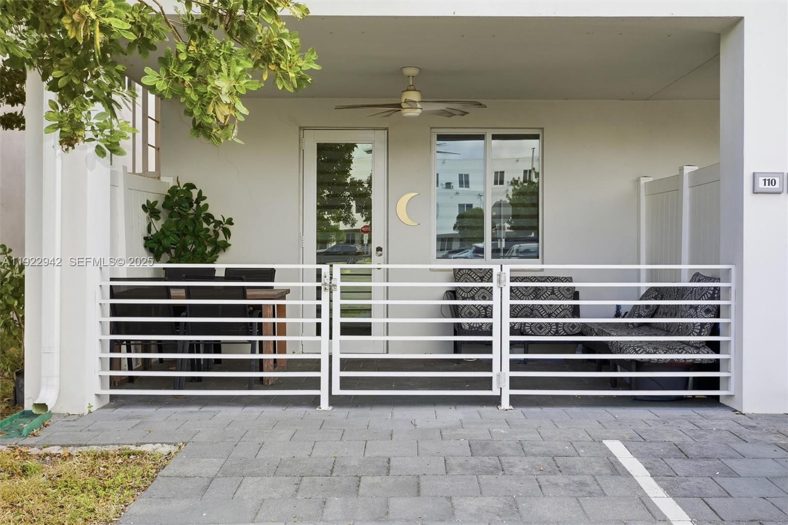 6420 Northwest 102nd Path, Unit 110 Doral, FL 33178 - Photo 7 of 47 a view of a house with a window and a door