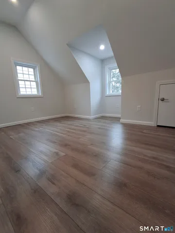 a bathroom with a sink and a large mirror