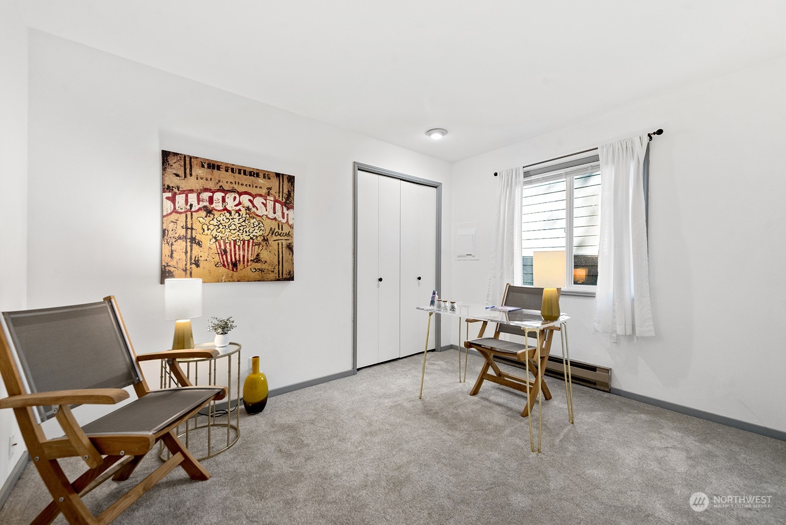 4118 58th Place Southwest, Unit 2 Seattle, WA 98116 - Photo 16 of 23 a view of a workspace with furniture and a window