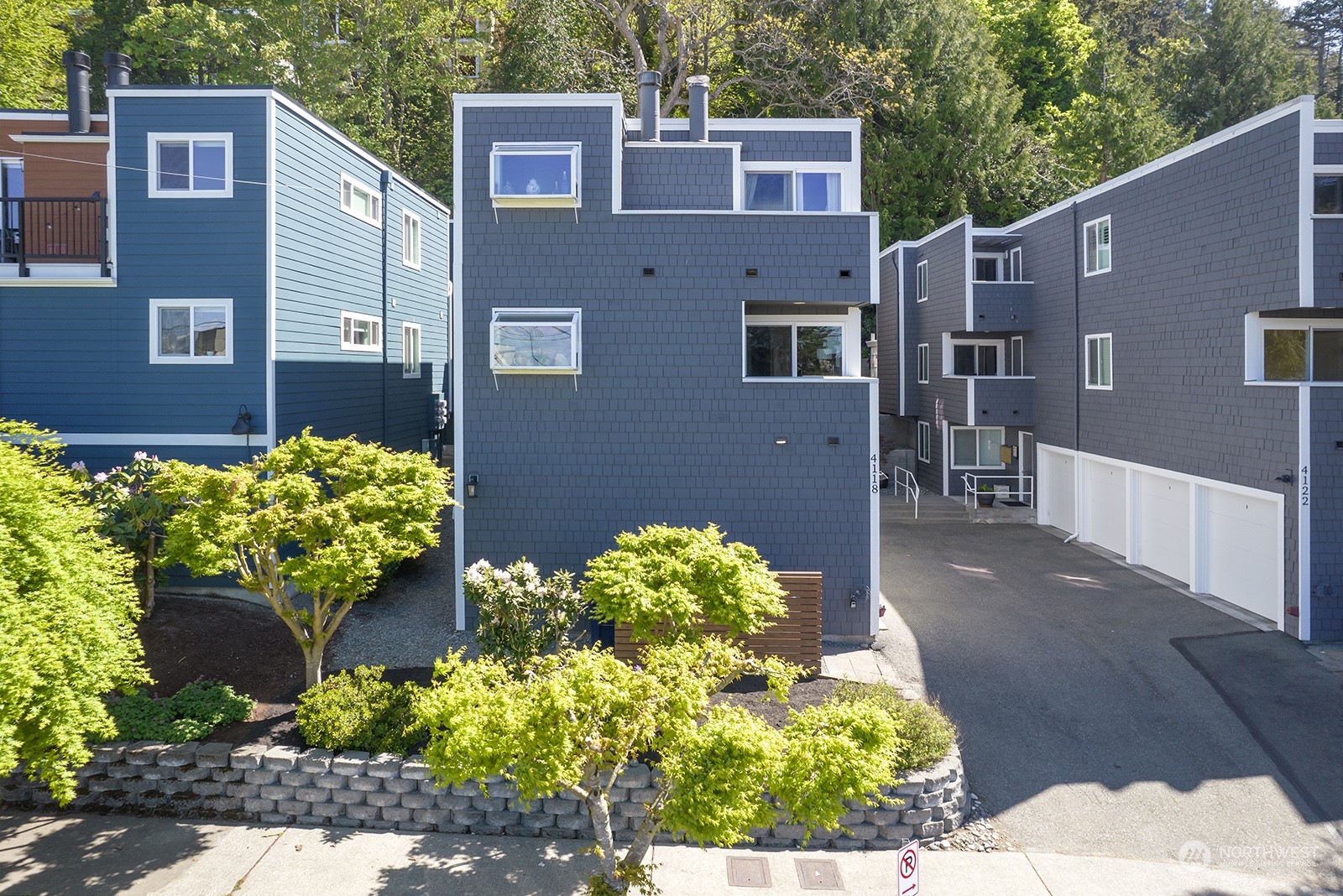 4118 58th Place Southwest, Unit 2 Seattle, WA 98116 - Photo 23 of 23 a view of a back yard of the house