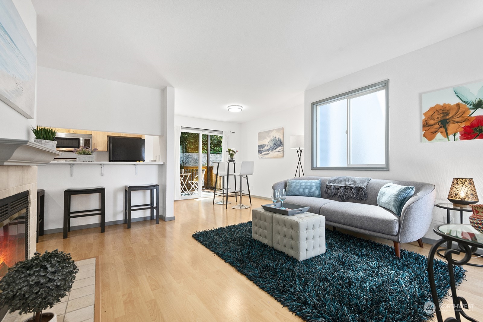 4118 58th Place Southwest, Unit 2 Seattle, WA 98116 - Photo 3 of 23 a living room with furniture and a flat screen tv