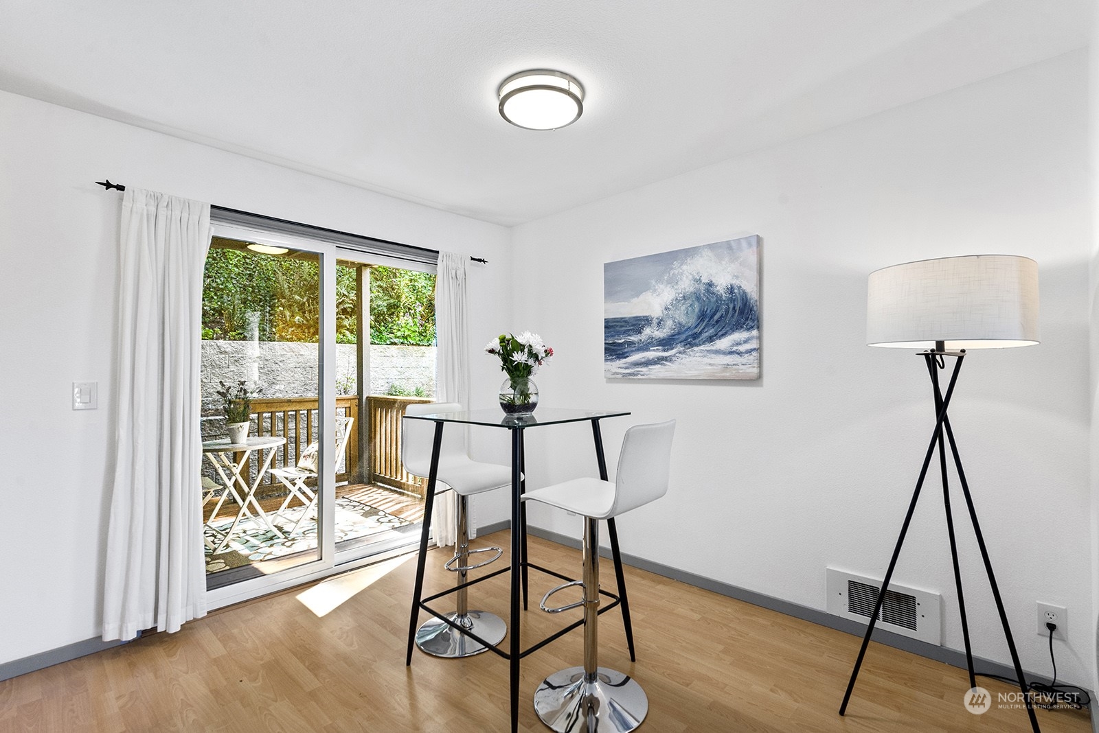 4118 58th Place Southwest, Unit 2 Seattle, WA 98116 - Photo 8 of 23 a view of a workspace with furniture and a window