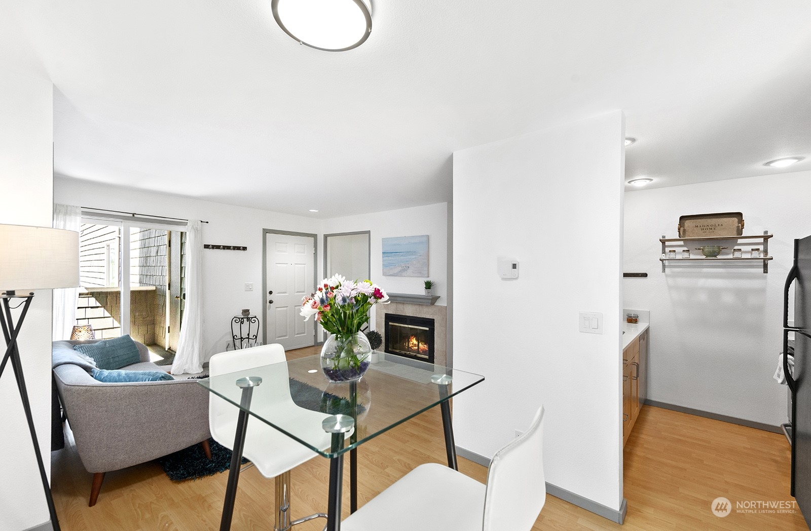 4118 58th Place Southwest, Unit 2 Seattle, WA 98116 - Photo 10 of 23 a living room with furniture and kitchen view