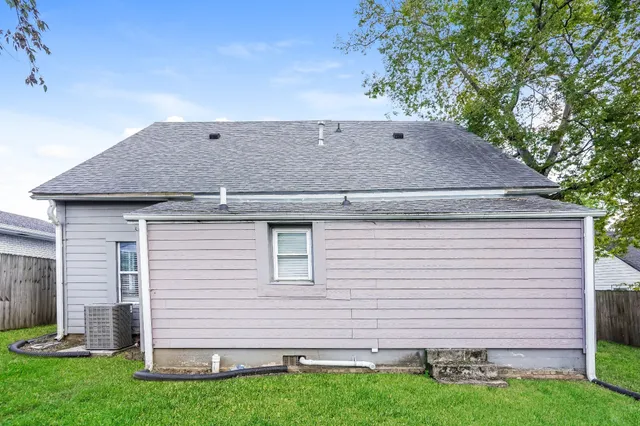 a house view with a garden space