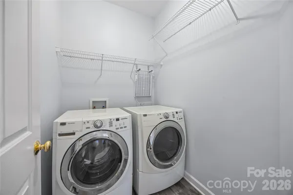 a utility room with dryer and washer