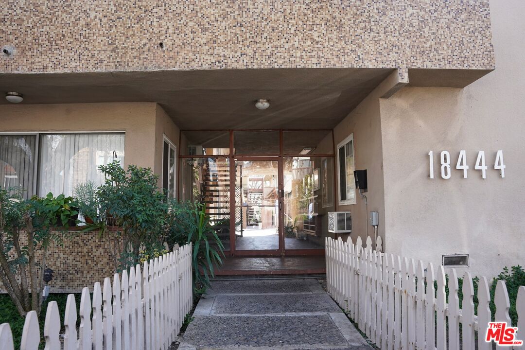 18444 Collins Street, Unit 14 Tarzana, CA 91356 - Photo 2 of 18 a view of porch