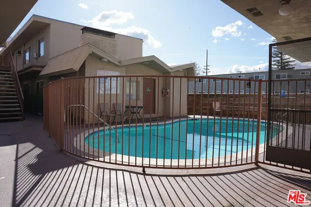 a view of a balcony with a swing