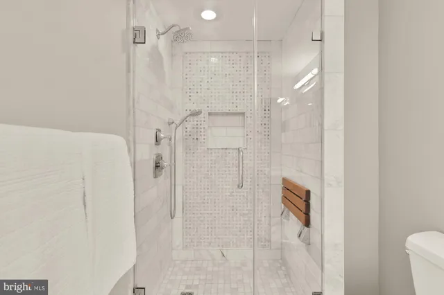 a bathroom with a double vanity sink mirror and double