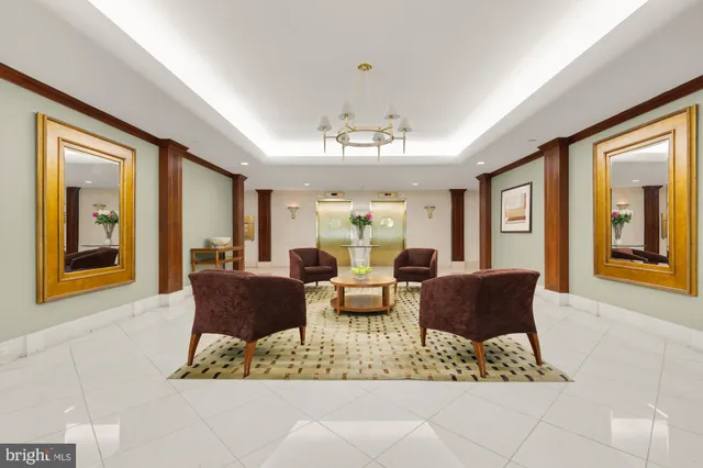 a view of a swimming pool and lounge chair