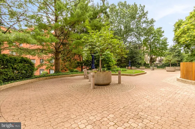 a room with lots of appliances and cabinets