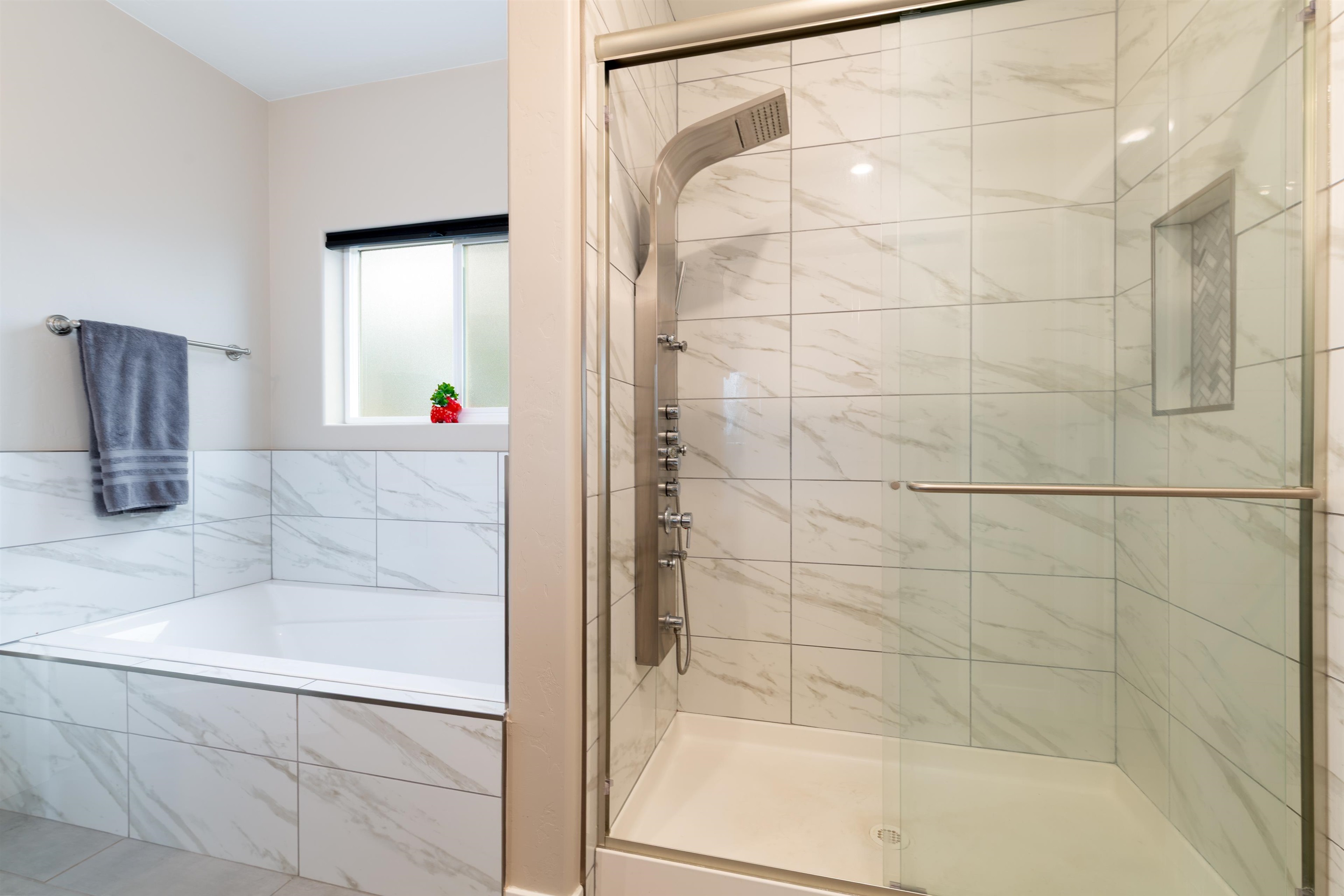 1518 Myers Lane Fruita, CO 81521 - Photo 15 of 39 a bathroom with a bathtub and shower