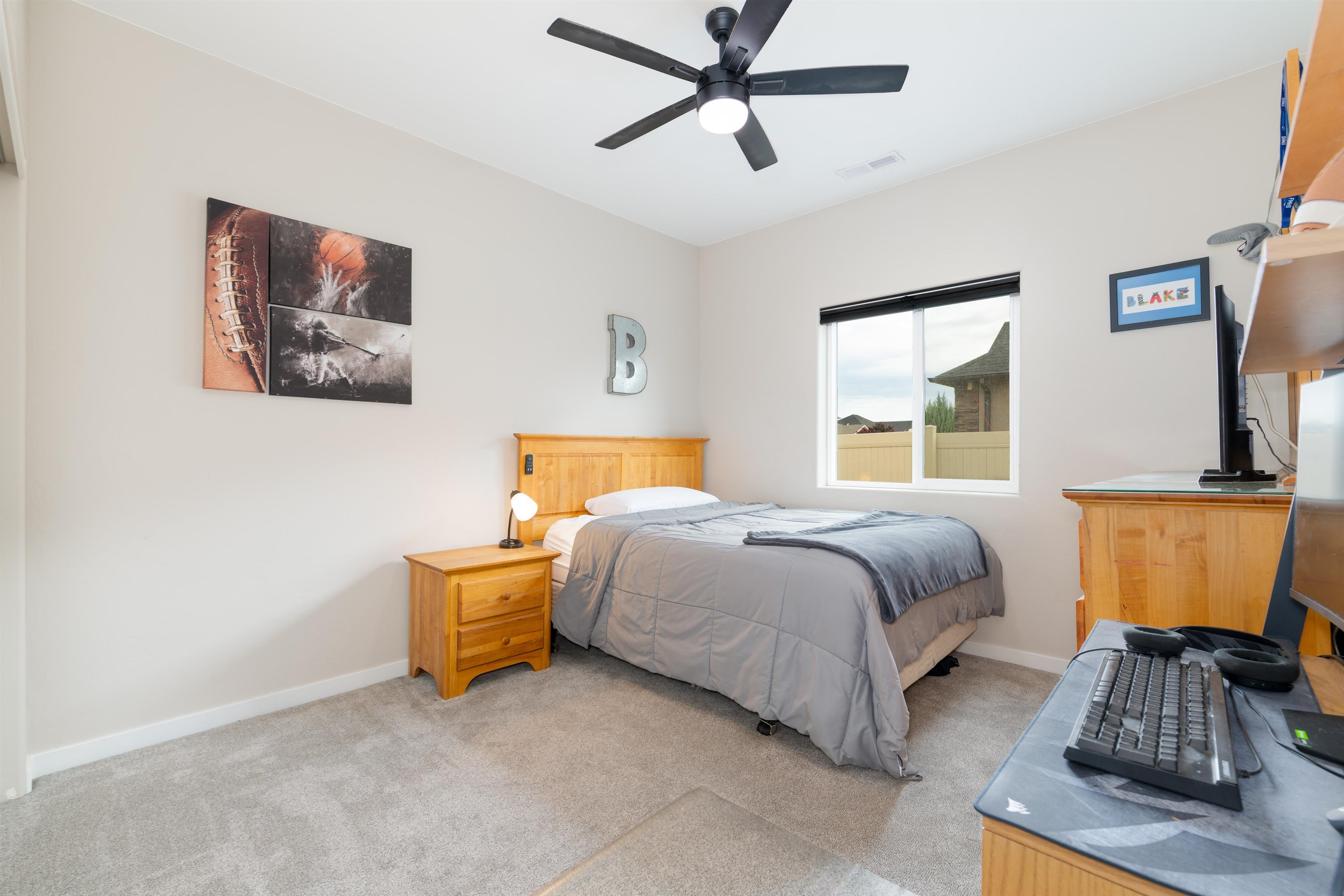 1518 Myers Lane Fruita, CO 81521 - Photo 18 of 39 a bedroom with a bed and window